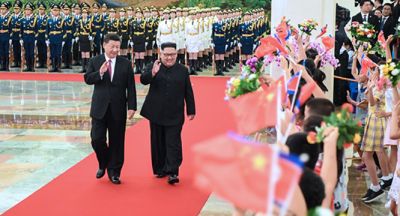 习近平同朝鲜劳动党委员长金正恩举行会谈
